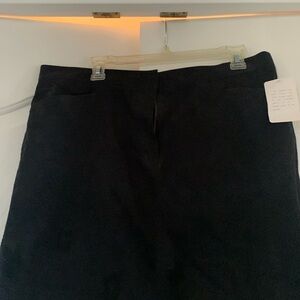 Jones Sport stretch black size 14 jean skirt with grin and back pockets